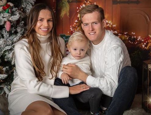 Martyna Swiderska with her husband Karol Swiderski and son Antos Swiderski.